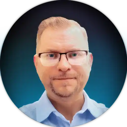 A founder stands facing towards the camera while she addresses her off-camera team.